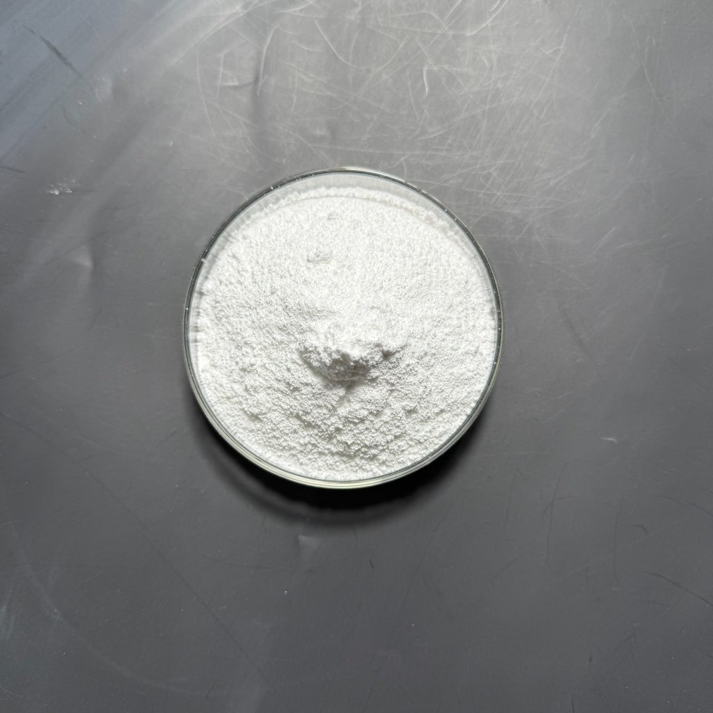 Magnesium oxide white powder in a glass dish