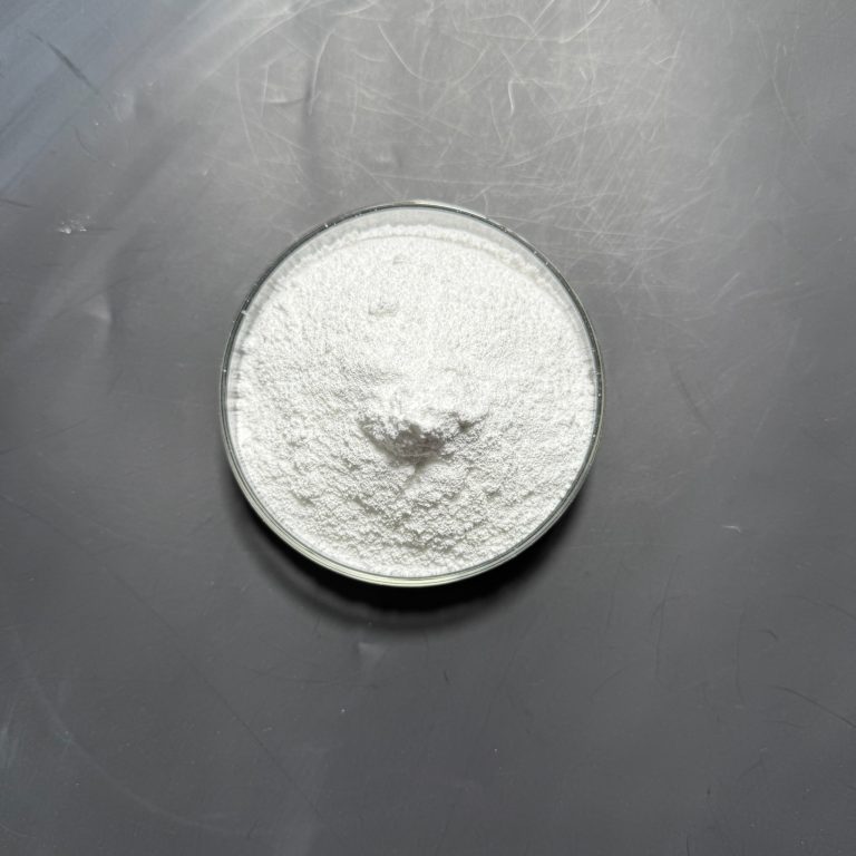 Magnesium oxide white powder in a glass dish